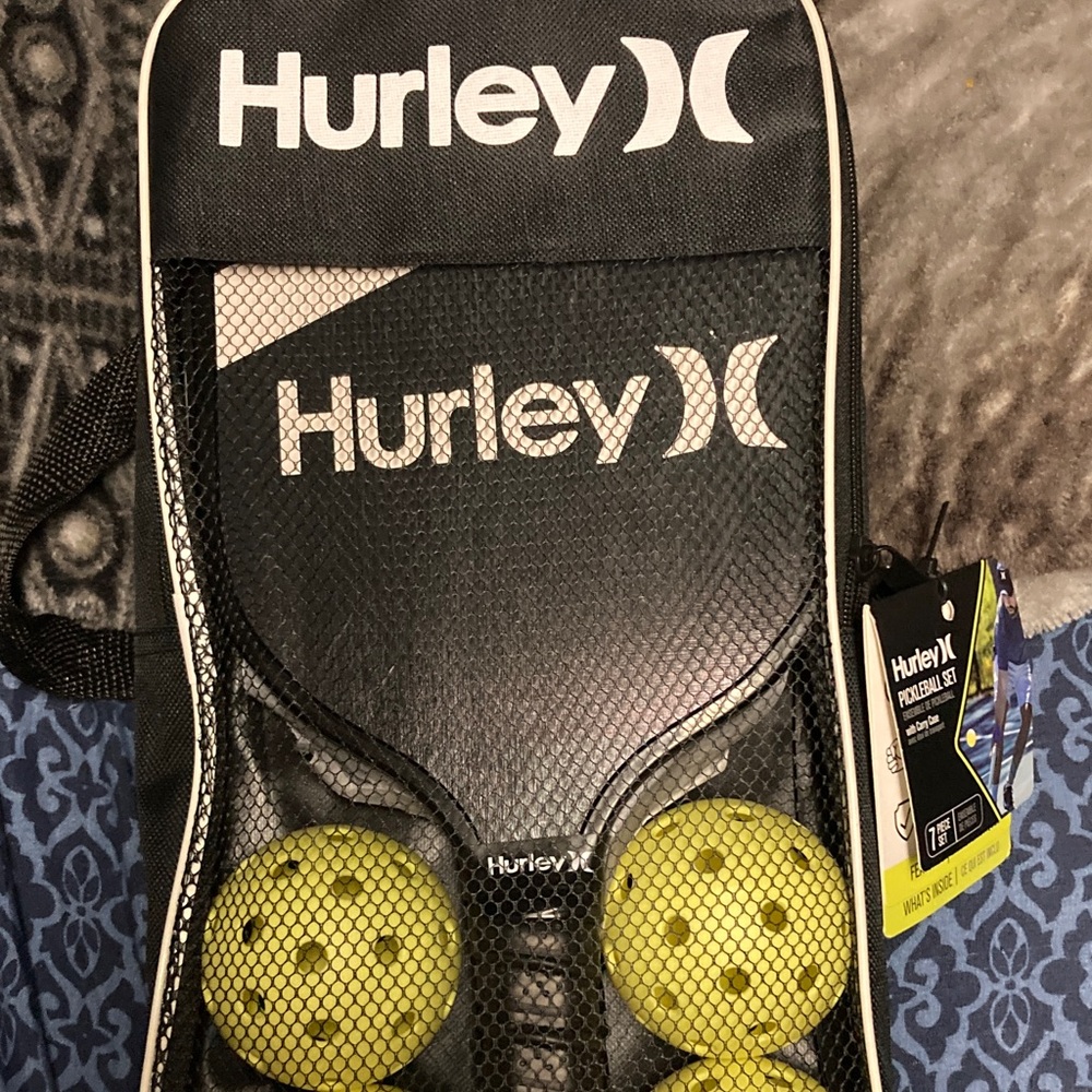 Hurley Pickle Ball Set with Black and White Stripe Paddle and 4 Yellow Balls